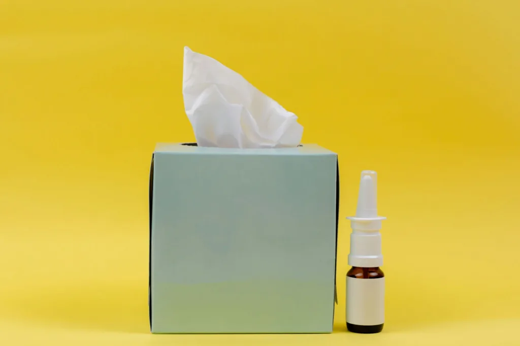 white and brown bottle beside white tissue box - allergy and asthma friendly